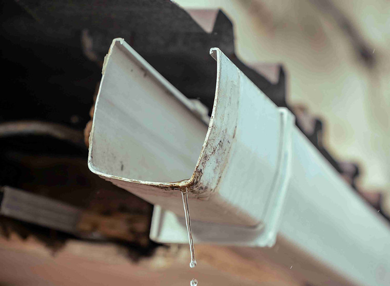roof gutter with water coming out
